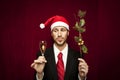 Young funny guy with christmas hat Royalty Free Stock Photo