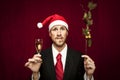 Young funny guy with christmas hat