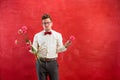 Young funny man with broken bouquet