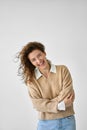 Young happy woman laughing standing at white background, close up portrait. Royalty Free Stock Photo