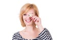 Young funny woman holding sea star and smiling