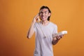 Young furious man talking on landline phone, shouting Royalty Free Stock Photo