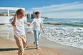 Young gay couple smiling happy walking at the beach Royalty Free Stock Photo