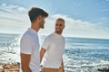 Young gay couple smiling happy walking at the beach promenade Royalty Free Stock Photo