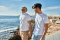 Young gay couple smiling happy walking at the beach promenade Royalty Free Stock Photo