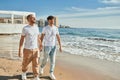 Young gay couple smiling happy walking at the beach Royalty Free Stock Photo