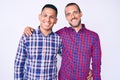 Young gay couple of two men wearing casual clothes with a happy and cool smile on face Royalty Free Stock Photo