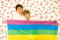 Men were happy together over rose background .  LGBT gay couple love concept Royalty Free Stock Photo