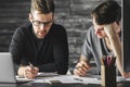 Young gentlemen doing paperwork