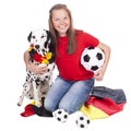 Young german soccer fan with dalmatian dog