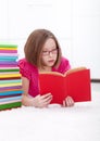 Young girl absorbed by reading