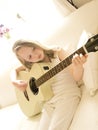 Young Girl on a Acoustic Guitar 3