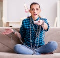 Young girl addicted to tv wasting her time Royalty Free Stock Photo