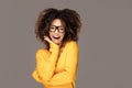 Young girl with an afro wearing eyeglasses Royalty Free Stock Photo