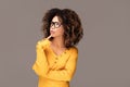 Young girl with an afro wearing eyeglasses Royalty Free Stock Photo