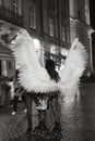 Young girl with angel wings on Lviv streets