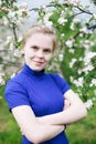 Young girl in   apple orchard in   village Royalty Free Stock Photo