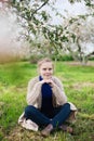 Young girl in   apple orchard in   village Royalty Free Stock Photo