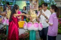 Young Girl Bathing the Buddha during Vesak Day