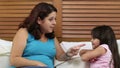 Young girl being grounded by her mother