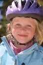 Young girl in a bicycle helmet Royalty Free Stock Photo