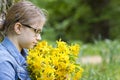 Young girl with big bouquet of spring flowers Royalty Free Stock Photo