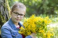 Young girl with big bouquet of spring flowers Royalty Free Stock Photo