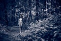 Young girl in bikini posing at the tropical forest. Sepia Royalty Free Stock Photo