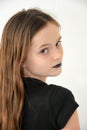 Young girl with black painted lips