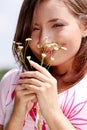 Young girl in blooming meadow Royalty Free Stock Photo