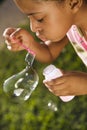 Young Girl Blowing Bubbles Royalty Free Stock Photo