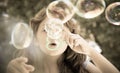 Young girl blowing bubbles Royalty Free Stock Photo