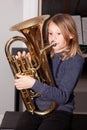 Young girl blowing horn Royalty Free Stock Photo