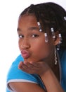 Young girl blowing a kiss