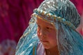 Young Girl in Blue Lace Headdress Royalty Free Stock Photo