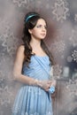 Young girl in blue vintage dress late 19th century Royalty Free Stock Photo