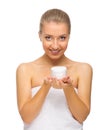 Young girl with body cream jar Royalty Free Stock Photo