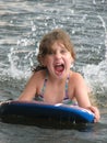 Young girl on boogie board Royalty Free Stock Photo