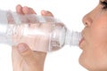 Young girl with bottle of mineral water