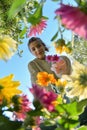 Young Girl with Bouquet Below View of Flowers Royalty Free Stock Photo
