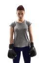 Young girl with boxing gloves under harsh light Royalty Free Stock Photo
