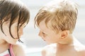 Young Girl and Boy Looking at Each Other Royalty Free Stock Photo