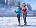 Young girl and a boy training at Cheile Gradistei Biathlon Arena - Cross country skiing