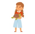 Young girl with brown hair holding a turtle and apple, wearing red sweater and blue pants. Child caring for pet, healthy