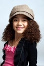 Young girl in brown hat