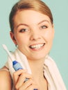 Young girl brushing oral cavity. Royalty Free Stock Photo