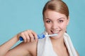 Young girl brushing oral cavity. Royalty Free Stock Photo