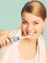 Young girl brushing oral cavity. Royalty Free Stock Photo