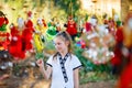 Young girl with burmese string puppets Royalty Free Stock Photo