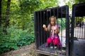 Young girl in cage